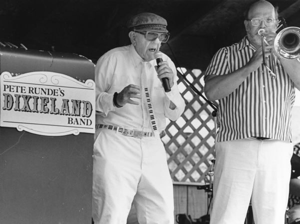 "Mayville's Raymond ?, also know as Peggy McEathon sings with the Pete Runde Dixieland Band."