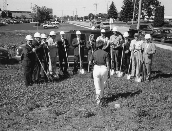 "Jean Howarth, photographer for 'Country Weekly,' prepared to photograph the Theresa State Bank groundbreaking in Lomira."