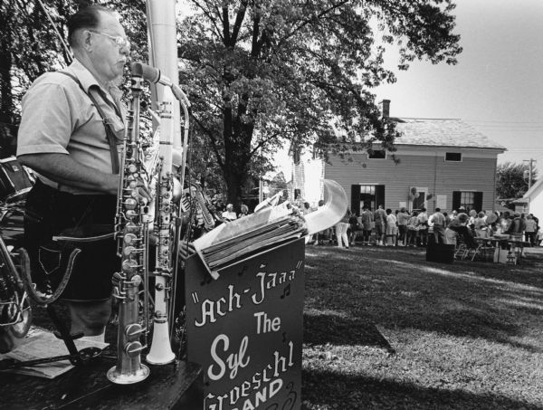 "A Syl Groeschl Band entertains at the Annual Historical Society Ice Cream Social."