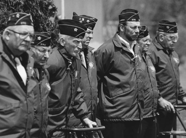 "Memorial Day veterans — Del McKinney, Rudy Heinecke, Ralph Widmer, Virgil Krueger, Ken Schenning, Ralph Ruecker and Les Beck."