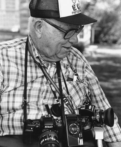 "Photographer Edgar G. Mueller of Mayville."