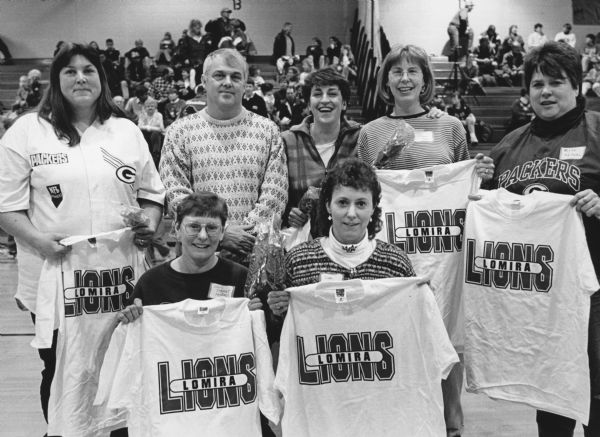 "A 20-year reunion was held at the Lomira High School gym by girls who were members of the 1978 State Championship high school basketball team. Members are: Cheri Sternat, Lisa LaVarda, Bev Kuen, Coach Rick Bloohm, Janice Emmer, Kay Widmer, and Kristi Neitzel."
