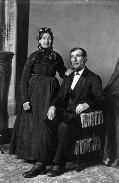 Full-length portrait of Charlotte Liermans Goetsch and William Goetsch, parents of Mary Goestch Krueger, and grandparents of the photographer, Alexander Krueger.