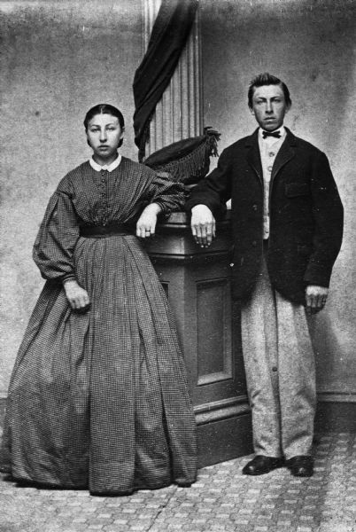 Full-length portrait of Mary Goetsch Krueger, at age 15, with her brother Herman.