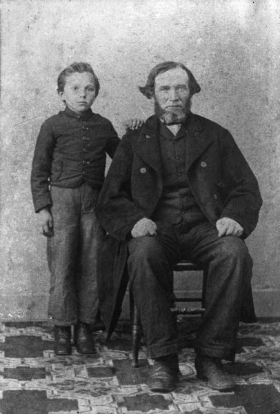 Full-length portrait of Henry and William Krueger.