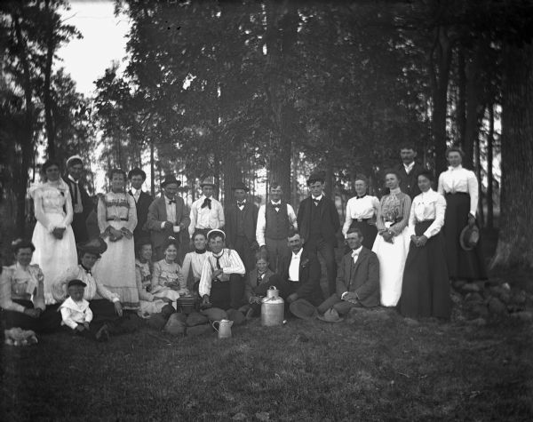 Group portrait of people who attended the picnic in the Grosnicks family woods. Sarah Krueger is standing in the back row on the end.