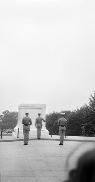 View of the changing of the guard at the Tomb of the Unknown Soldier in Arlington Cemetery.
