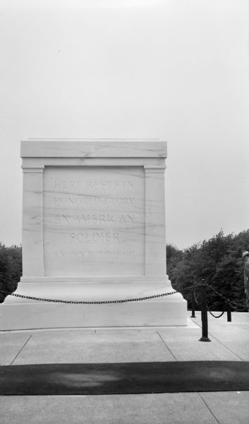 View of the inscription on the Tomb of the Unknown Soldier in Arlington Cemetery. The inscription reads: "Here rests in honored glory an American Soldier, Known but to God."