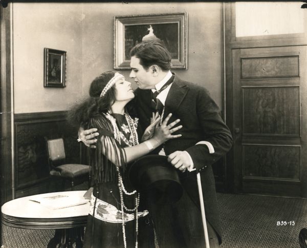 Leonore Ulric as the American Indian girl Alona, "the half-breed daughter of a wealthy white man" (Moving Picture World 8/19/1916, p. 1268). She is in the embrace of Frank Colvin (played by Colin Chase).