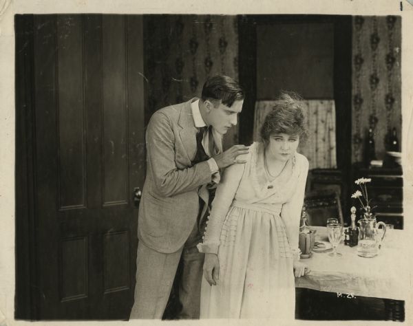Bob Hildreth (a sculptor played by Frank Mayo) has designs on his student Lois Page (played by Ethel Clayton) in this scene still from "Easy Money."