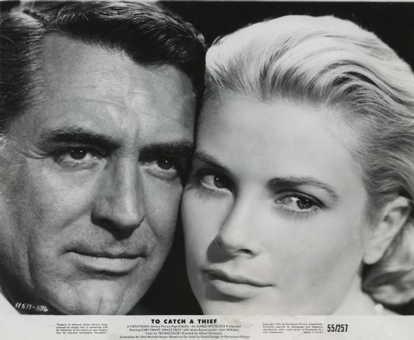 Cary Grant and Grace Kelly are cheek to cheek in this close-up publicity still for "To Catch a Thief" (Paramount 1955).