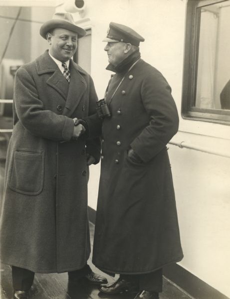 Original caption attached to the print: "Emil Jannings German actor arrived today. Emil Jannings, German actor who was born in Brooklyn in 1886 returned to his native land on the Hamburg-American liner 'Albert Ballin.' Mr. Jannings is bidding goodbye to Captain Wiehr, commander of the boat."

Jannings, actually born in Switzerland, had come to the United States under contract with Paramount Famous Lasky Corporation to make motion pictures in Hollywood.