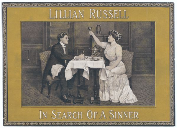 Color lithograph poster. Lillian Russell, as Georgiana Chadbourne, sits down to a meal with her intended, to whom she lifts her glass in a toast. The caption across top reads "Lillian Russell" and at bottom "In Search of a Sinner."