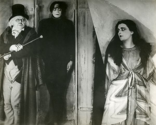 From left to right Werner Krauss (playing Dr. Caligari), Conrad Veidt (as Cesare the somnambulist), and Lil Dagover (as Jane Olsen) in a scene from the expressionist classic silent film.