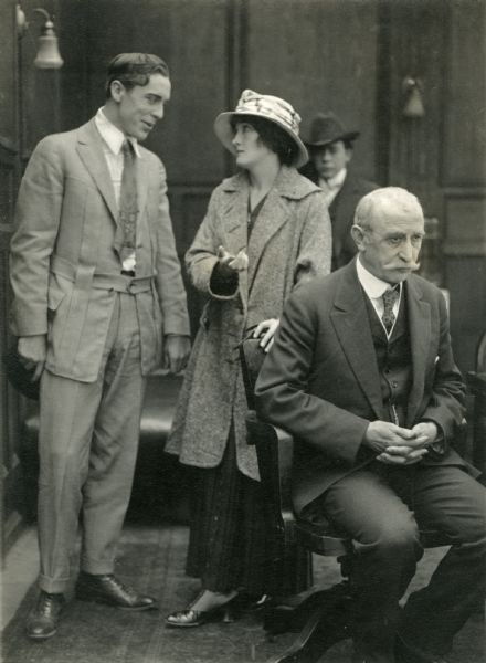 Jane Pepper (played by Irene Hunt) and her brother (Jack Conway) are talking as their father (Charles Lee) sits at his desk. In the background is actor Vester Pegg.