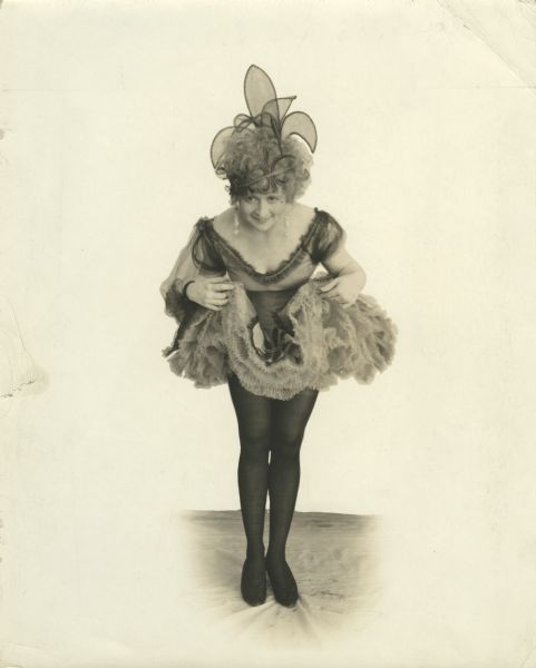 Actress Bessie Barriscale as Anna Gerard, the Parisian singer at the Black Rat night club in "A Trick of Fate" (Exhibitors Mutual, 1919).
