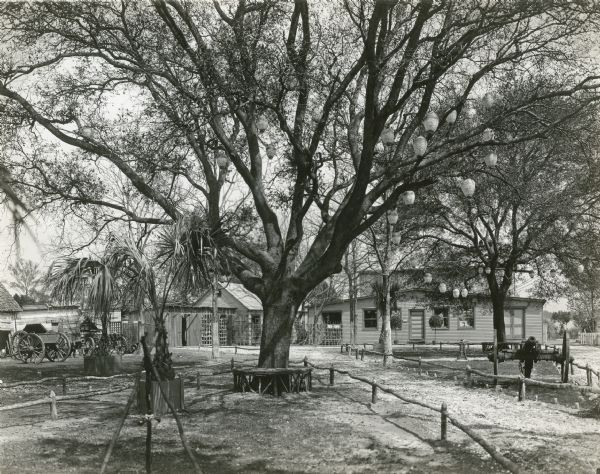 Photograph of the winter studios of the Kalem Company showing outbuildings on the grounds of the Roseland Hotel on the St. Johns River near Jacksonville, Florida. The canon were used in Kalem's Civil War themed productions like "The Drummer Girl of Vicksburg" and "The Confederate Ironclad." Kalem filmed there from 1908 until 1917.
