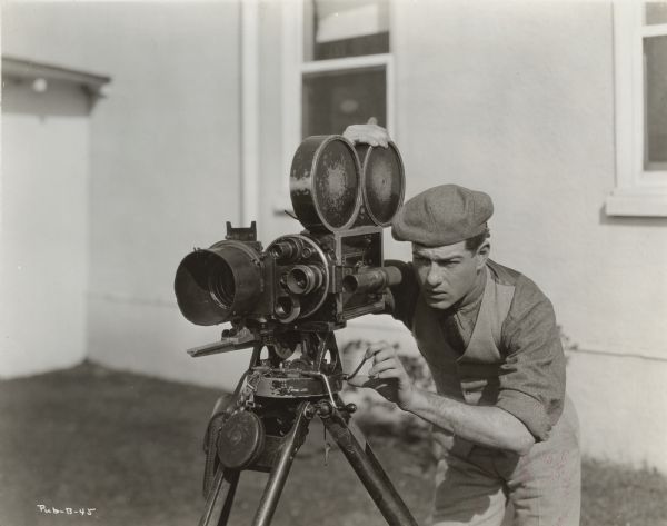 Original caption: "Cullen Landis, who has become one of the screen's most popular figures, used to be a camera-man, or cinematographer, as they say in French. Since Cullen won his Goldwyn contract he devotes all his time to acting, with a little hunting and fishing on the side."
