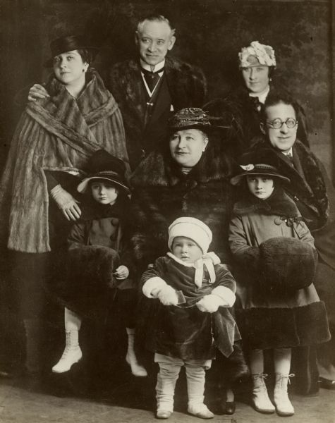 Original caption: "Frank Keenan, Star of Pathé Plays, snapped with Mrs. Keenan, their two daughters, son-in-law, and grand children just before his departure from New York for Los Angeles where his future feature films will be made. Mr. Keenan's first picture under the Pathé Banner 'Loaded Dice' is greeted as the most interesting thing he has yet done. He follows with a screen version of Elizabeth Lee's 'Simeon Tetlowe's Shadow', and of Sir Henry Irving's greatest hit, both under the direction of Ernest C. Warde, nephew of Frederick Warde, and producer of 'The Vicar of Wakefield."