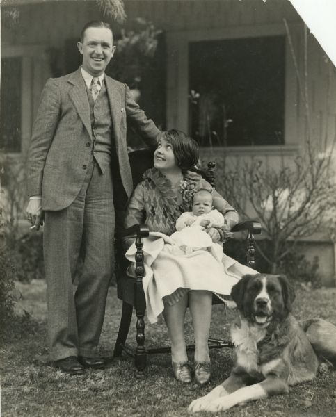 Actor Stan Laurel, his wife Lois Neilson, their newborn daughter Lois, and their dog Lady.