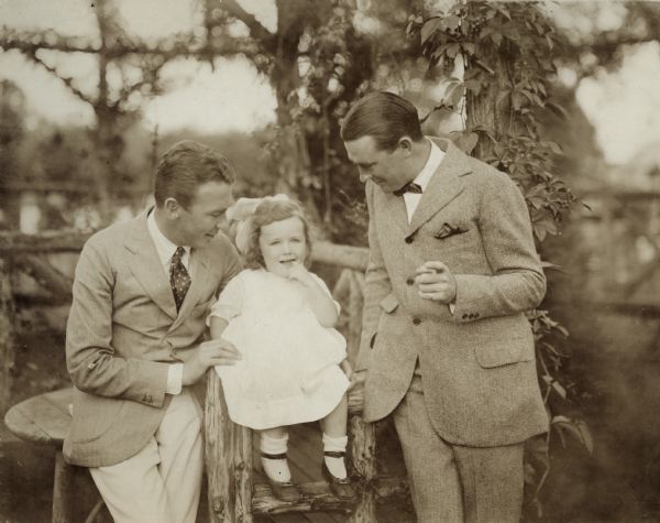 Silent film actor Tom Moore, his little daughter Alice Moore, and his brother the actor Owen Moore.