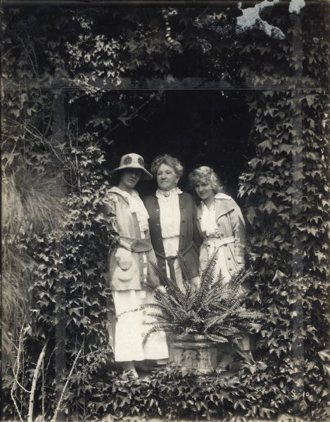 From left to right: Charlotte Shelby (mother of Mary Miles Minter), Mrs. E.M. Miles (mother of Charlotte Shelby), and Mary Miles Minter, the silent film star.