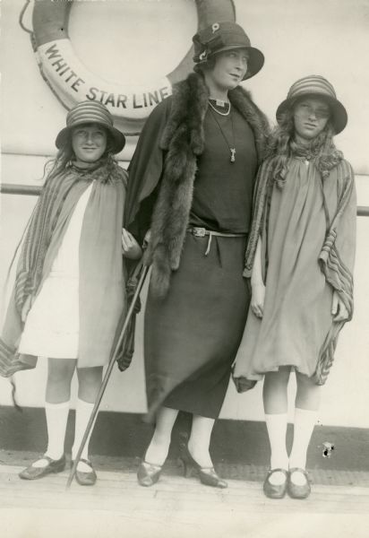 Original caption: "Arrived on S.S. Majestic Mrs. Orson D. Munn (Margaret Lawrence) and her two children L-R Elizabeth and Louise."

Item from Hedda Hopper's 20 September 1948 newspaper column: "What a script there is in the life saga of Margaret Lawrence, the Broadway star who married the rich Orson Munn, had two daughters, and then met silent western movie actor Louis Bennison, who later shot her, then killed himself. Now Margaret's daughter, Betty Munn, is earning a living as a waitress to support herself and her two daughters."