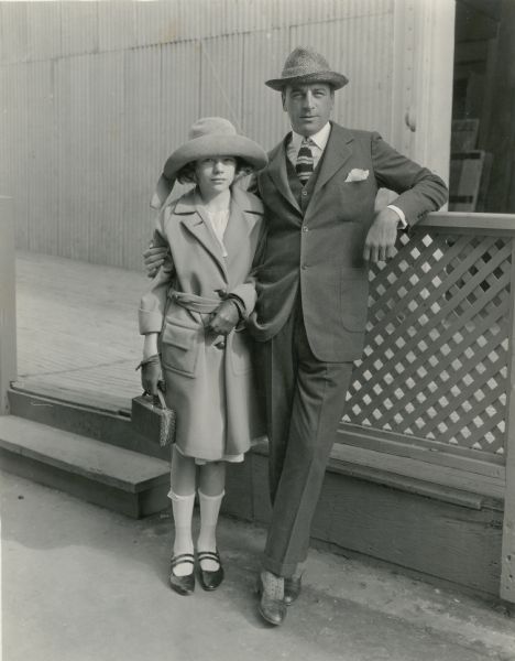 Original caption: "Milton Sills, featured player in 'Adam's Rib,' Cecil B. De Mille's new Paramount picture, and his eleven year old daughter Dorothy."
