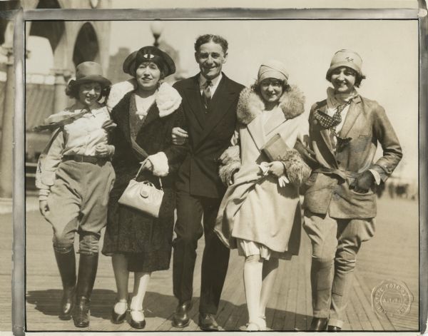 Original caption: "Fred Stone, America's Foremost Comedian and his happy family photographed recently on the Boardwalk in Atlantic City. Left to Right: Carol—age 12, Allene Crater (Mrs. Fred Stone), Fred Stone, Dorothy—co-starring with her father in 'Criss Cross,' Paula—age 15."