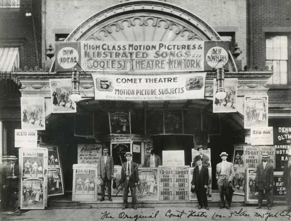 "The original Comet Theatre 100 3rd Ave. New York City."
Playbills in front of the nickelodeon advertise "A Mightier Hand," "Love in Mexico," "Jefferies-Johnson Fight," and "For Honor's Sake."