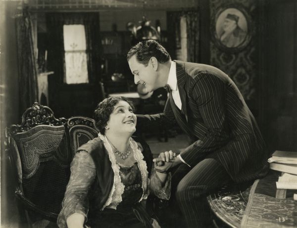 Mrs. Esther Meyers (played by Vera Gordon) and her son Robert Meyers (Harry Benham) in a scene still from "Your Best Friend" (Rapf 1922).