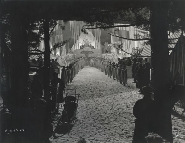Scene still of an enormous, elaborate winter set populated by scores of dancers designed by Joseph Urban for "The Young Diana."