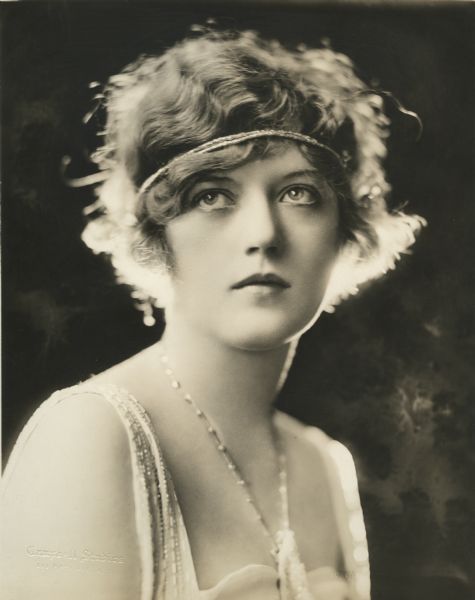 Head and shoulders publicity photograph of the actress Marion Davies used to promote the silent film "The Young Diana" (1922).