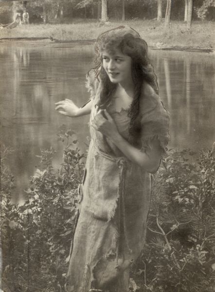 Anita Stewart wears a dress made of burlap playing Olympia in the Vitagraph production "The Wood Violet" (1912).
