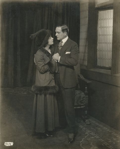 Ethel Gray Terry and Earle Williams embrace in a publicity still for the 1917 Vitagraph film "Arsene Lupin."