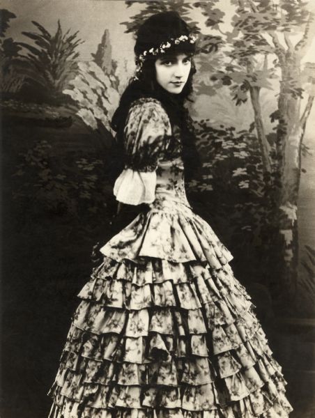 In this publicity still for D.W. Griffith's silent drama "The Birth of a Nation," Miriam Cooper is in Southern antebellum costume for her role as Margaret Cameron.