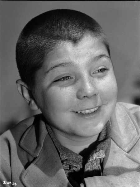 Unidentified child actor with very short hair in a publicity still for "The North Star."