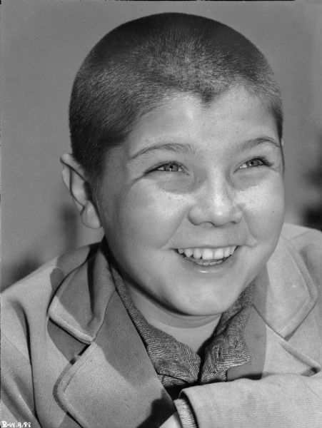 Unidentified child actor with very short hair in a publicity still for "The North Star."