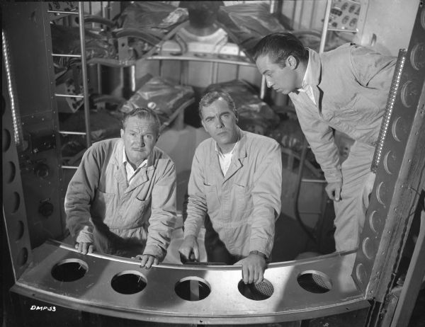"Destination Moon" scene still in the crew quarters of the spaceship with the actors Tom Powers, Warner Anderson, and Dick Wesson.