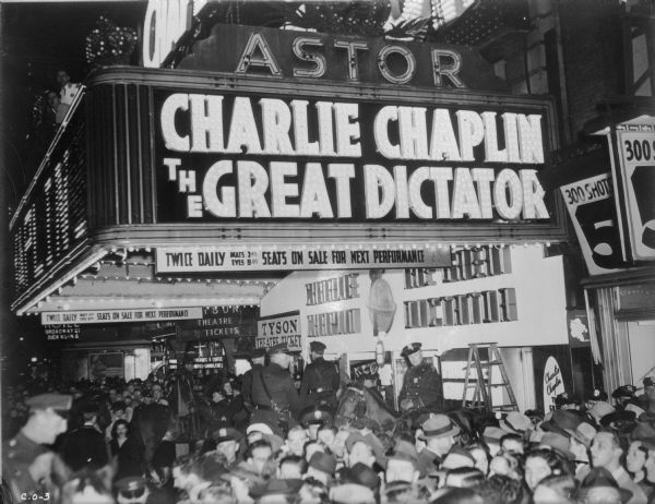 Crowds gather in front of the Astor Theatre in New York for the premiere of "The Great Dictator" on October 15, 1940.