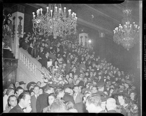 The grand staircase of the Capitol Theater in New York is packed with people waiting for the premiere of Charlie Chaplin's "The Great Dictator," October 15, 1940.