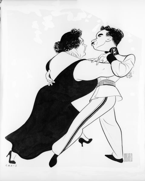 In this Al Hirschfeld cartoon promoting Charlie Chaplin's film "The Great Dictator," Hynkel, played by Chaplin, dances with Madame Napaloni, played by Grace Hayle.