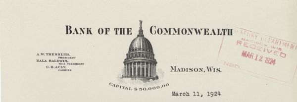 Memohead of the Bank of the Commonwealth, with a view of the dome of the Wisconsin state capitol building in Madison, Wisconsin, and names of bank officers.