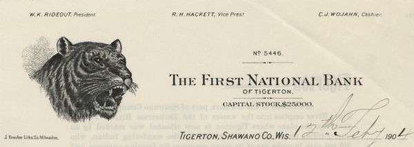 Numbered memohead of the First National Bank of Tigerton, Wisconsin, with a three-quarter view of a tiger's head with an open mouth and bared teeth, names of bank officers listed along the top, and a capital and stock note. Printed by J. Knauber Lithographing Company.