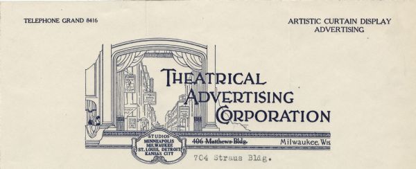 Memohead of the Theatrical Advertising Corporation of Milwaukee, Wisconsin, with a proscenium stage and two people in a box seat turned toward the stage, which frames a street scene of buildings with advertising signs. A scroll beneath the stage notes that studios for the company exist in Minneapolis, Milwaukee, St. Louis, Detroit, and Kansas City. Printed in blue ink.