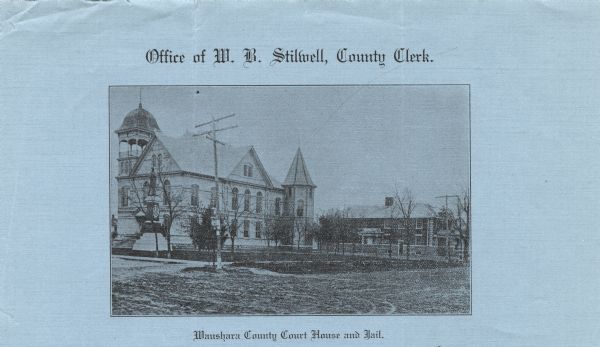 Letterhead on blue paper of the Waushara County Clerk's office, with a three-quarter halftone view of the county courthouse and jail and the Waushara County Civil War Memorial.