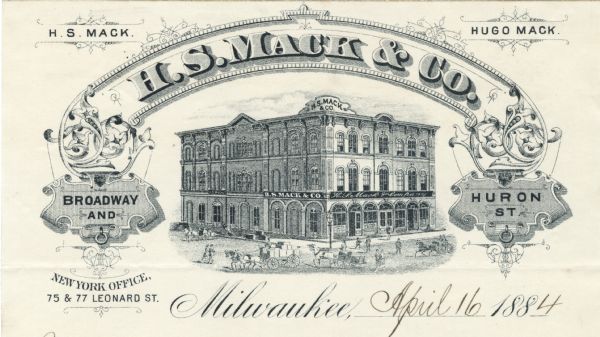 Letterhead of H.S. Mack & Company of Milwaukee, Wisconsin, with a three-quarter view of the company building, including people walking and driving horse-drawn wagons. The name of the company is displayed in an arched banner bracketed by scrollwork and printer's ornaments. Printed on lined notepad paper.