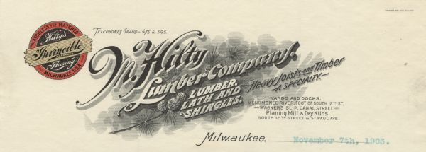 Memohead of the M. Hilty Lumber Company of Milwaukee, Wisconsin, with the Hilty's Invincible Hardwood Flooring trademark with the motto, "Matchless Yet Matched," printed in red, gold and black ink; and a background of evergreen branches and pine cones for the letterhead text, which reads at an angle. Printed by Wilmanns Bros. Litho., Milwaukee.