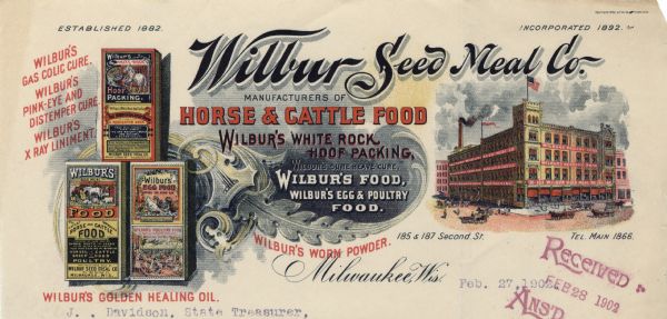 Memohead of the Wilbur Seed Meal Company of Milwaukee, Wisconsin, manufacturer of horse, cattle, poultry, and egg food, hoof packing, and various animal remedies. On the left are stacked boxes of products, scrolling foliage, and on the right a three-quarter view of the plant and horse traffic in the surrounding streets. Printed in full color by Northwestern Litho. Co., Milwaukee.