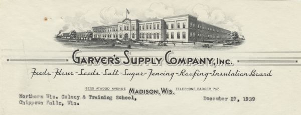 Memohead of Garver's Supply Company, supplier of feeds, flour, and building supplies, with a three-quarter view of the company building on Atwood Avenue.
